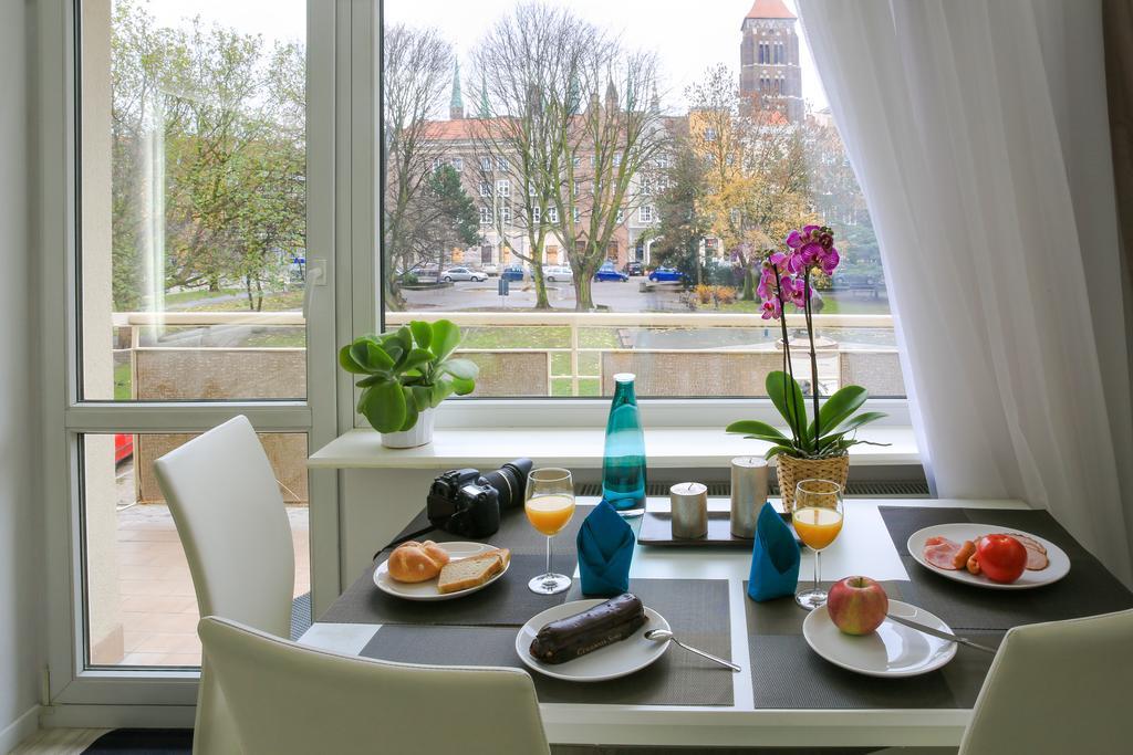 Apartament Swietojanska Гданск Стая снимка